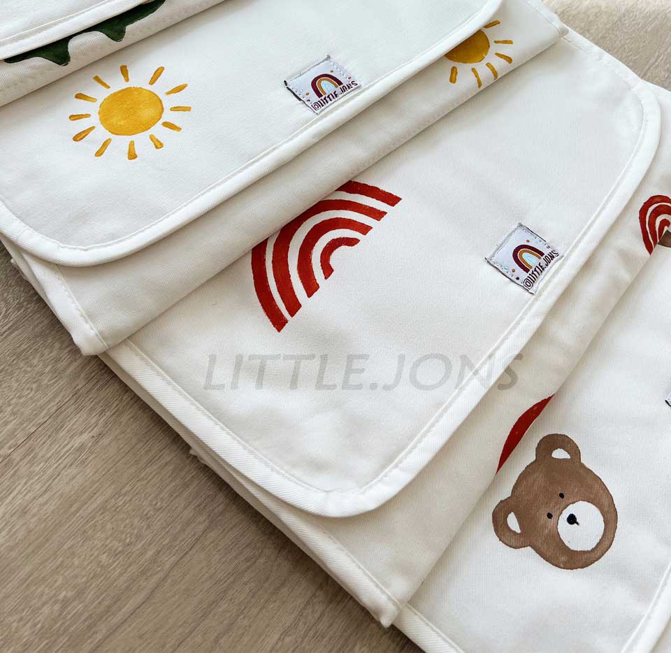 تشک تعویض نوزادی طرح رنگین کمون